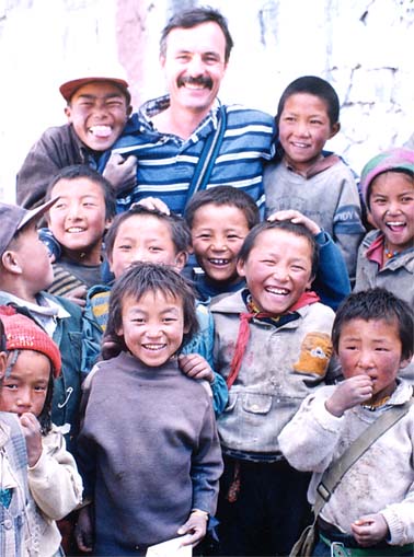 John%20with%20Tibet%20kids1.jpg