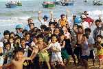 Kids on the beach - Vietnam by Motorbike